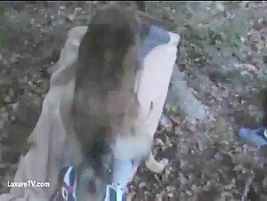 Woman sticks ass out for dog to fuck outdoors