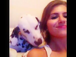 woman warms up with her dog